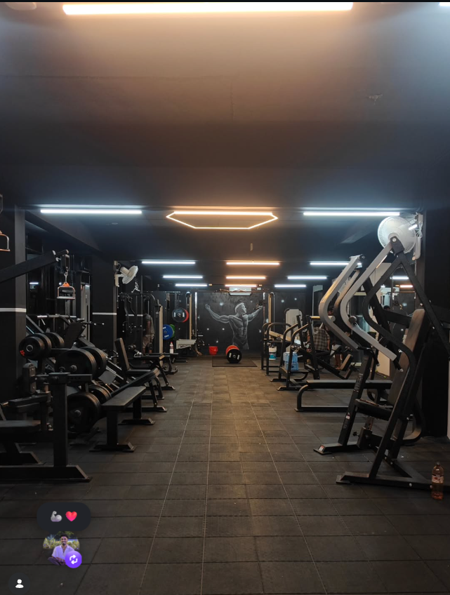 Strength training equipment at Predator Fitness Club gym in Haripad